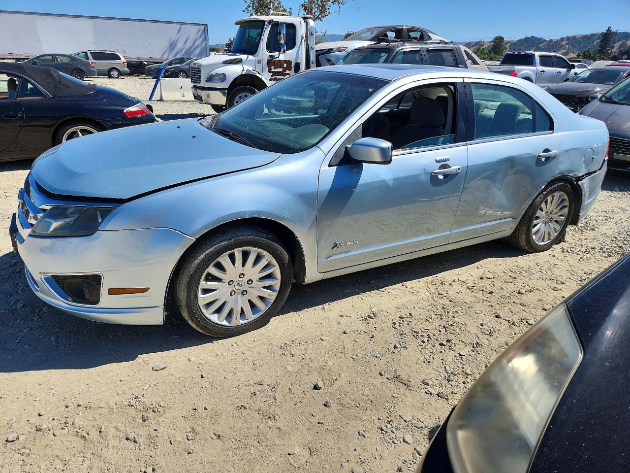 2010 Ford Fusion Hybrid, VIN 3FADP0L32AR284824 — Бок