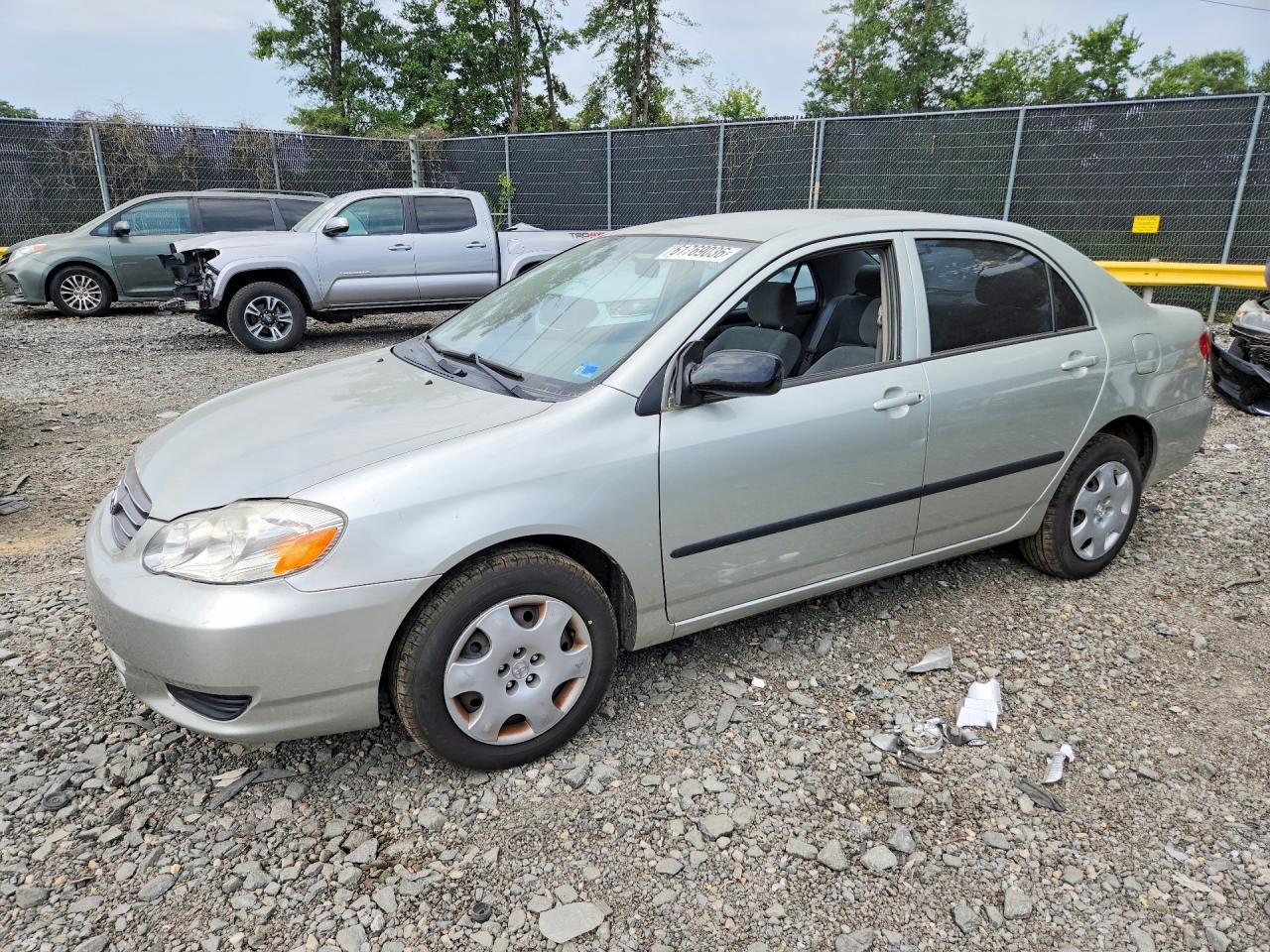 2003 Toyota Corolla LE, VIN JTDBR32E732004192 — Side