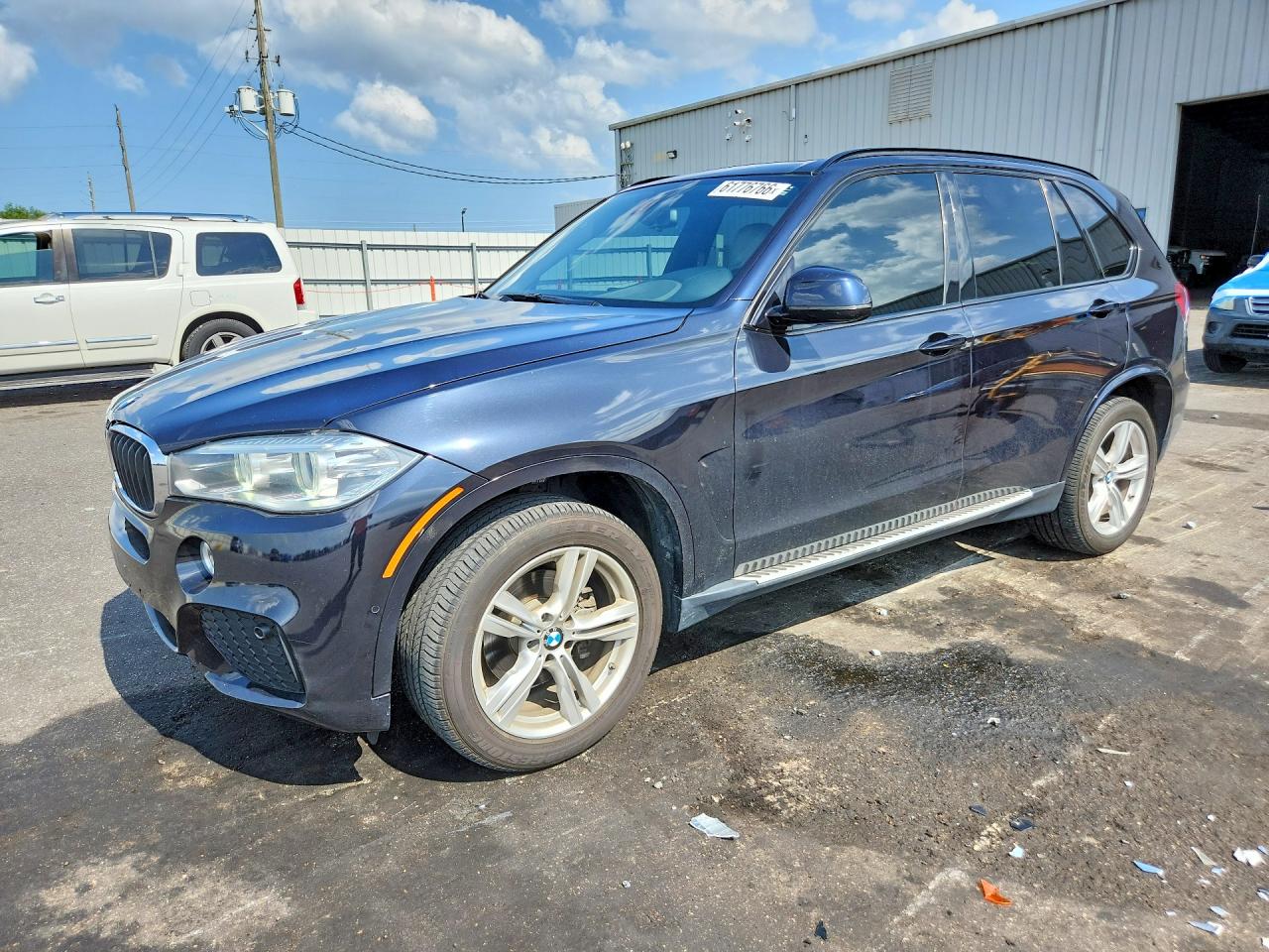 2015 BMW X5 xDrive35i, VIN 5UXKR0C54F0K53772 — Side