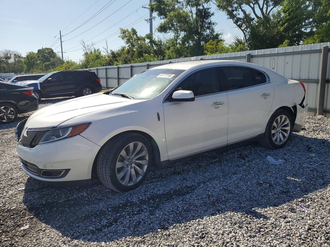 2013 Lincoln MKS, VIN 1LNHL9DK3DG617539 — Rear end