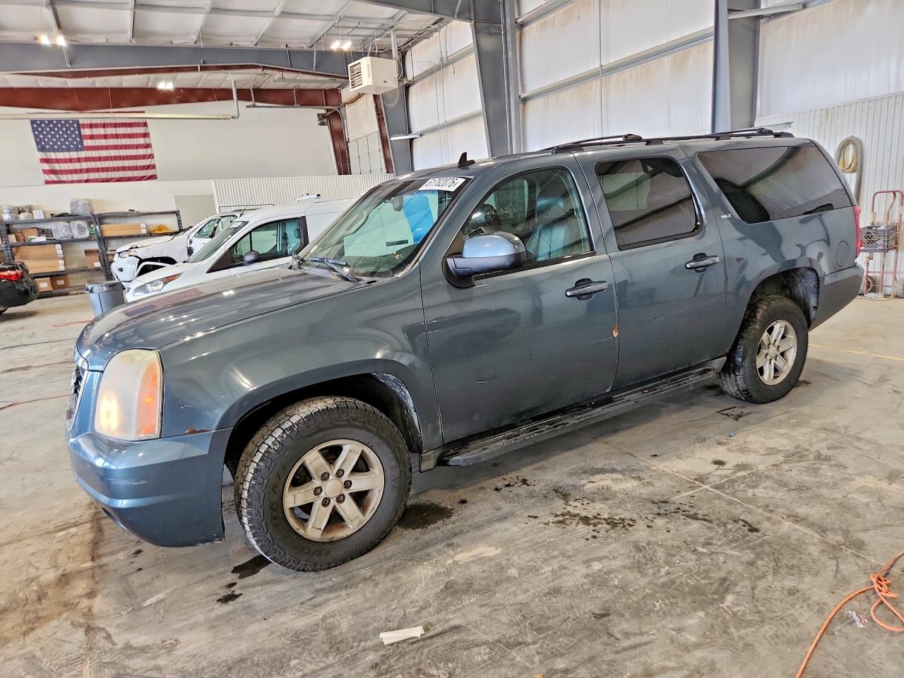 2010 GMC Yukon XL SLT, VIN 1GKUKKE32AR259441 — Hail