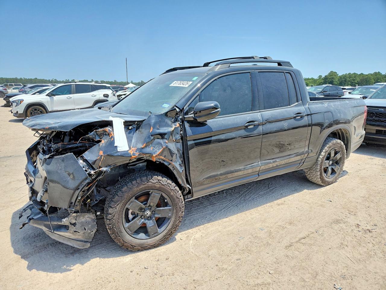 2025 Honda Ridgeline Black Edition, VIN 5FPYK3F84SB017682 — Front end