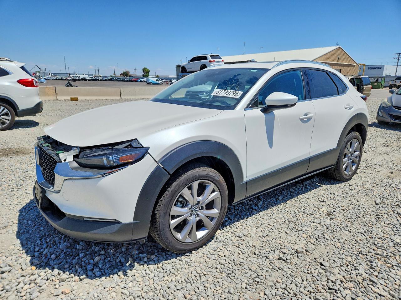 2021 Mazda CX-30 Premium, VIN 3MVDMBDL7MM300061 — Side