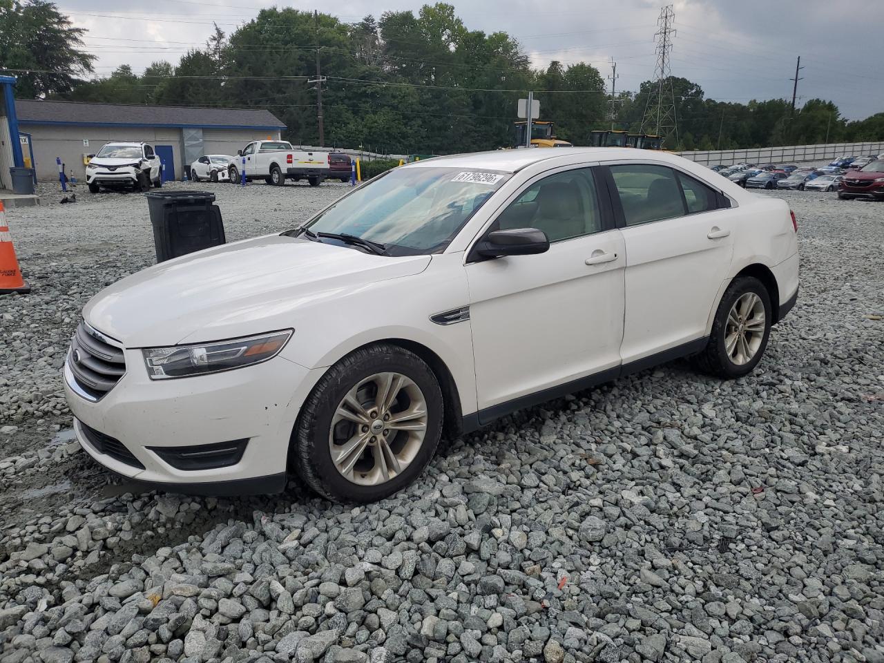 2015 Ford Taurus SEL, VIN 1FAHP2E8XFG160871 — Rear end
