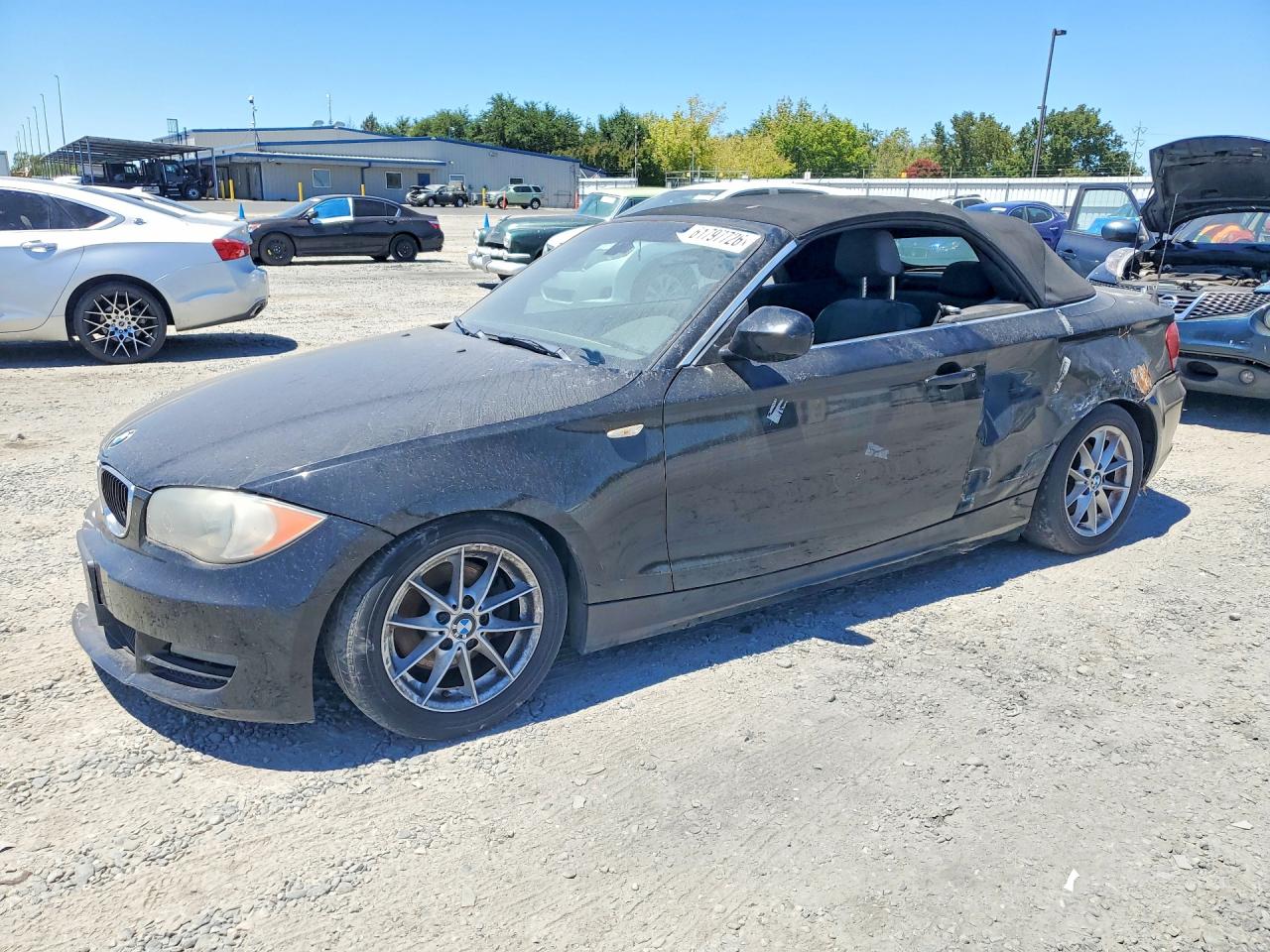 2011 BMW 1 Series 128i, VIN WBAUN1C51BVH82718 — Rear end