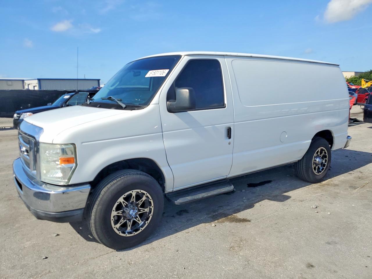 2014 Ford Econoline Cargo Commercial, VIN 1FTNE1EWXEDA85052 — Minor dents and scratches