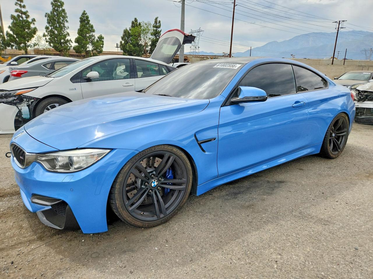 2015 BMW M4, VIN WBS3R9C55FK329961 — Бок