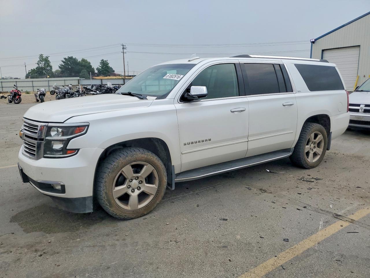 2016 Chevrolet Suburban LTZ, VIN 1GNSKJKC4GR298002 — Front end