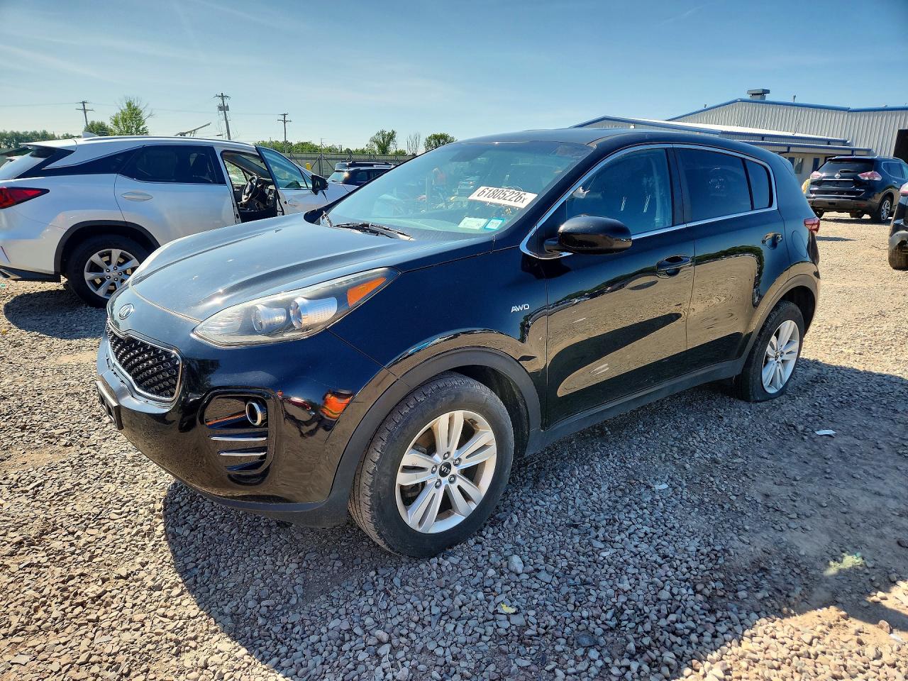 2019 Kia Sportage LX, VIN KNDPMCAC1K7491511 — Side