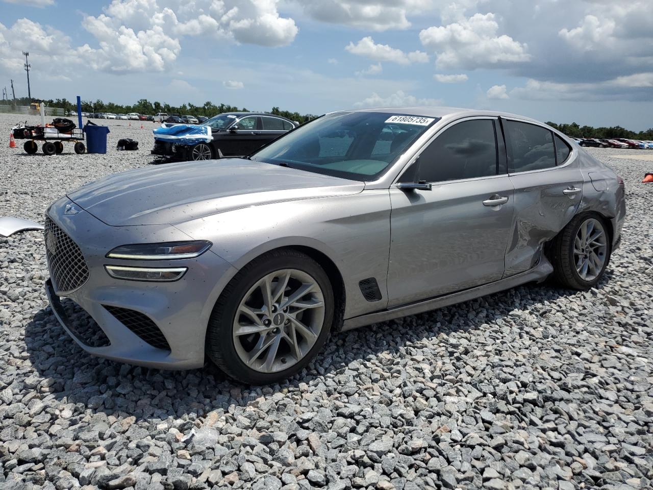 2022 Genesis G70 2.0T, VIN KMTG34TA5NU097666 — Бок