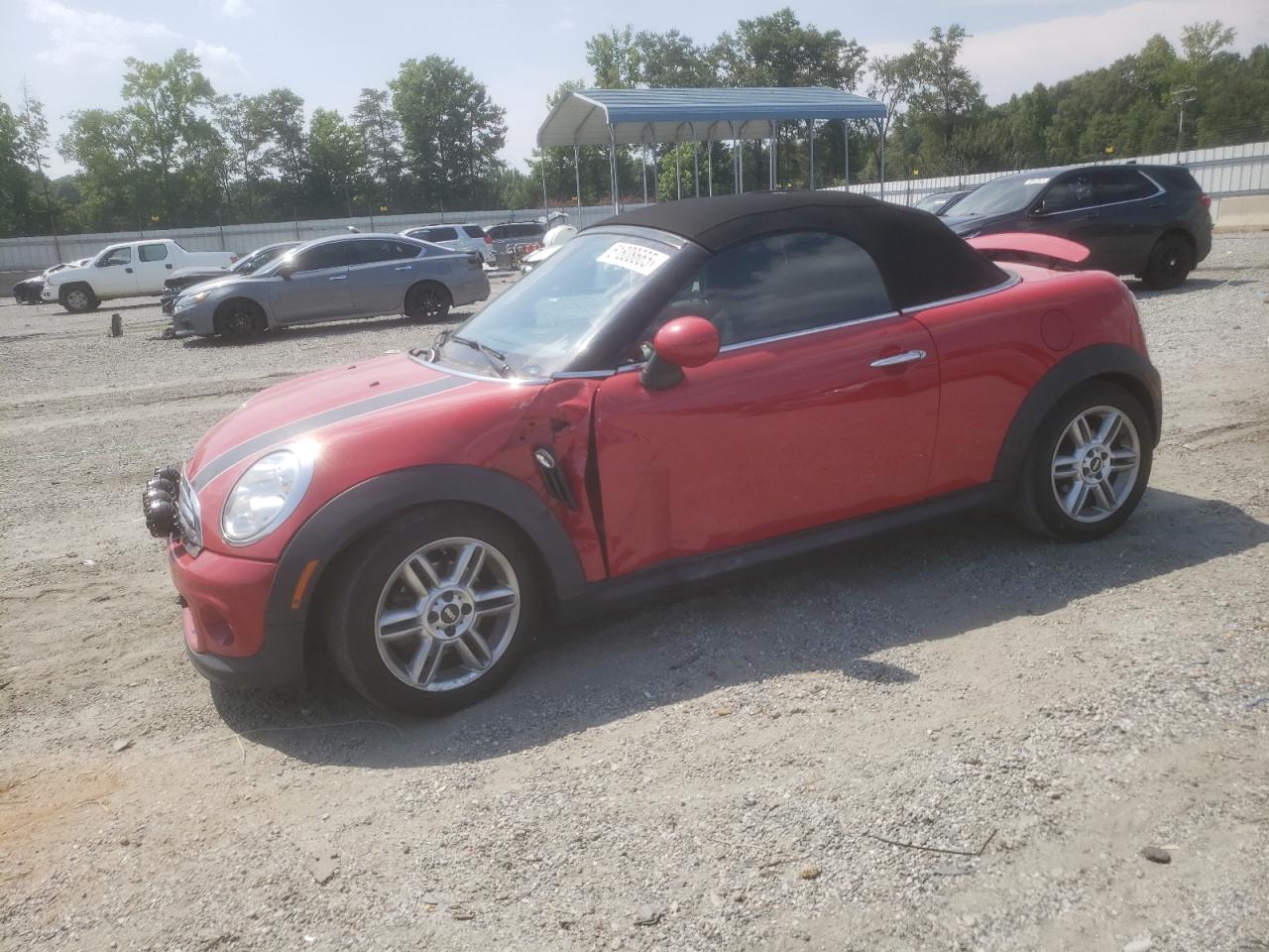 2014 MINI Roadster, VIN WMWSY1C50ET719640 — Side