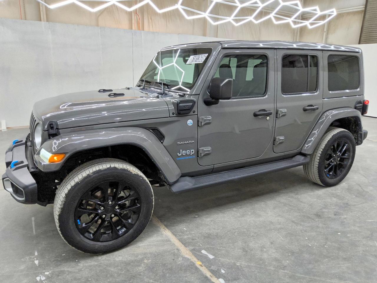 2023 Jeep Wrangler Sahara, VIN 1C4JJXP65PW515300 — Normal wear