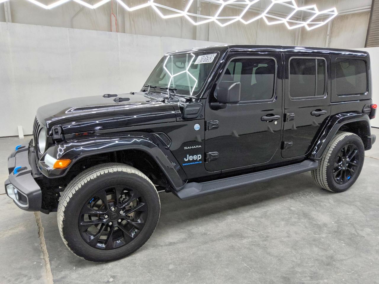 2023 Jeep Wrangler Sahara, VIN 1C4JJXP65PW557062 — Normal wear