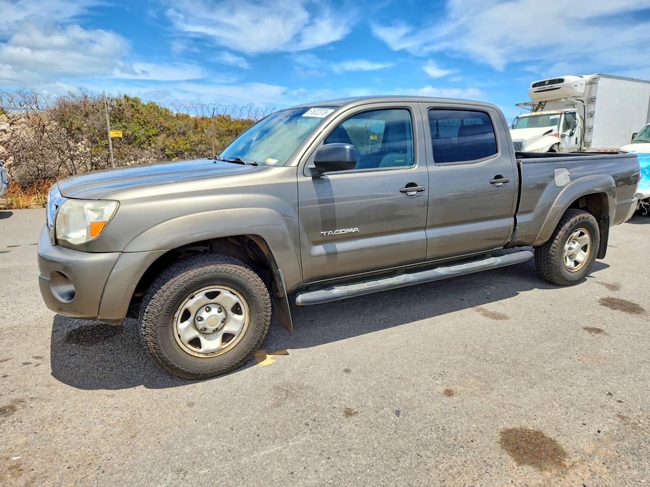 2010 Toyota Tacoma PreRunner, VIN 3TMKU4HN5AM025690 — Side