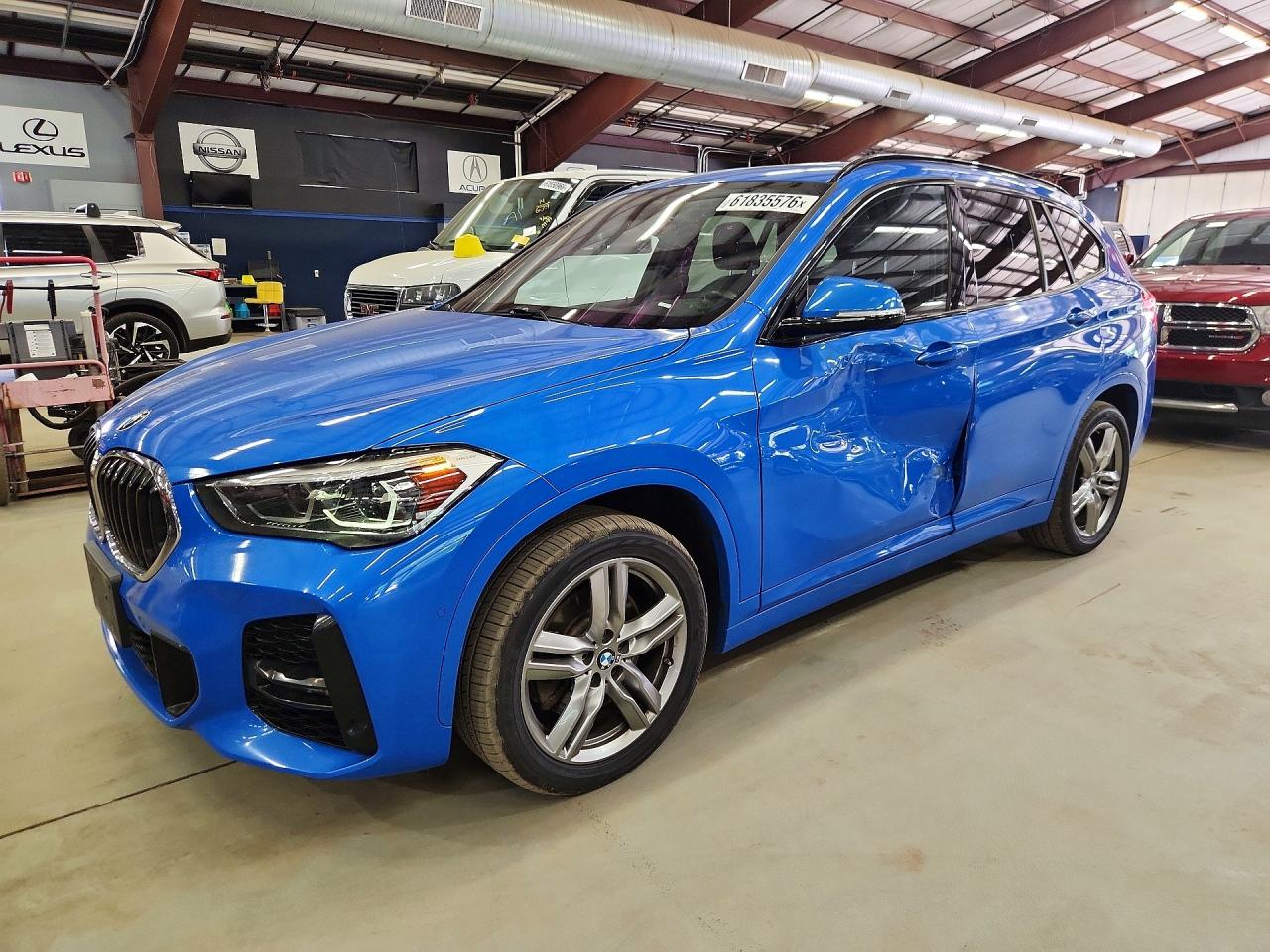 2021 BMW X1 xDrive28i, VIN WBXJG9C00M5S73550 — Side