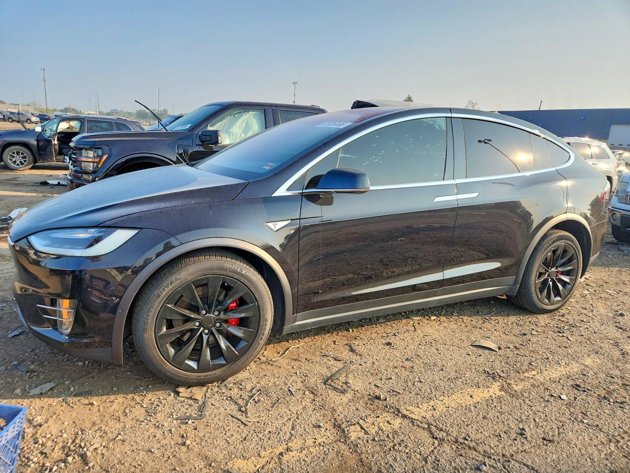 2016 Tesla Model X P90D, VIN 5YJXCBE43GF001314 — Side