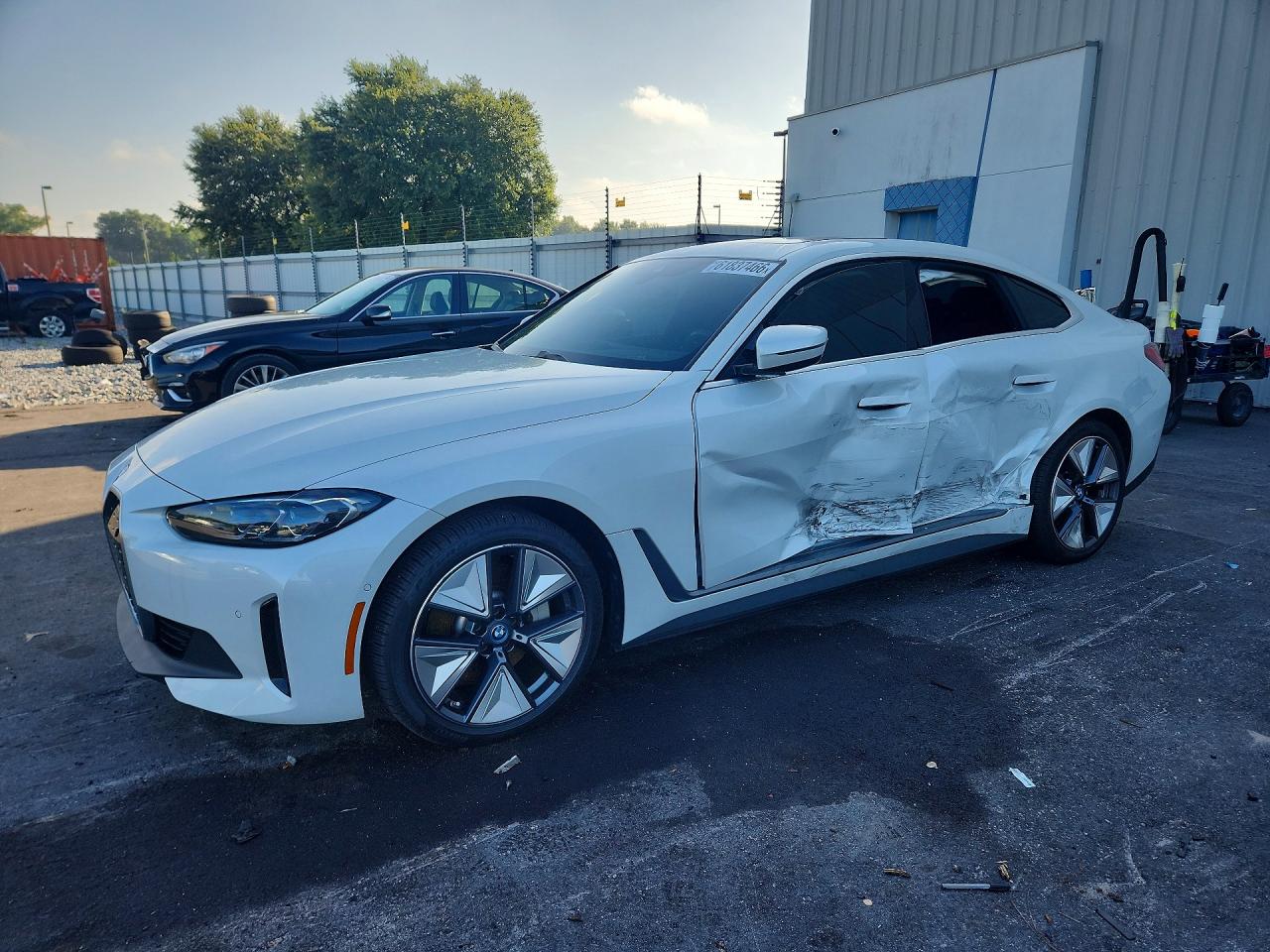 2022 BMW i4 eDrive40, VIN WBY73AW02NFM89328 — Side