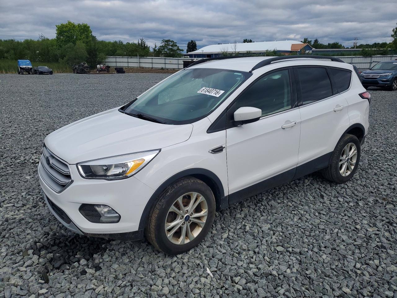 2018 Ford Escape SE, VIN 1FMCU0GD7JUD18410 — Side