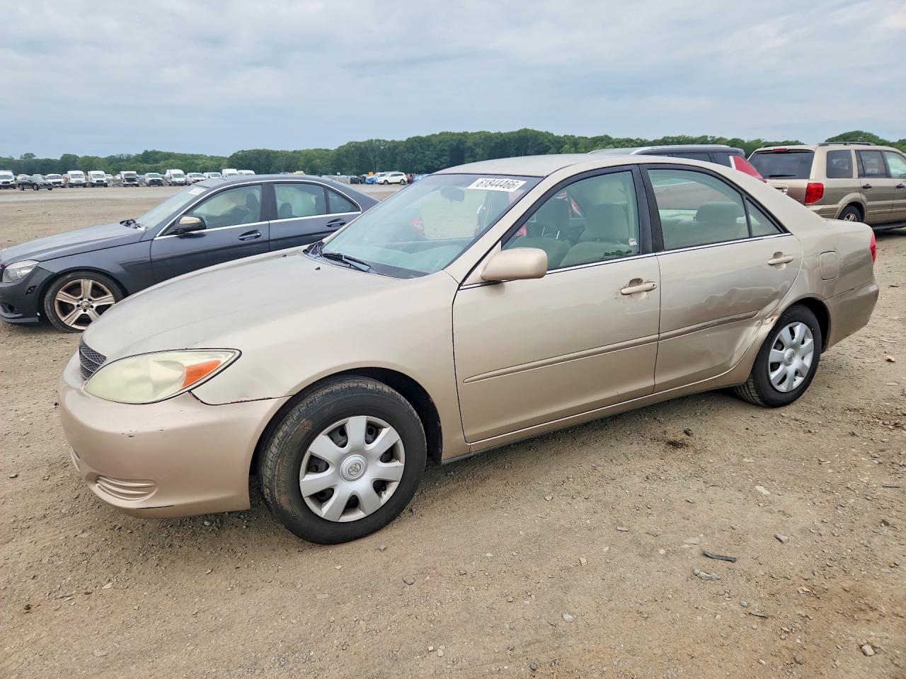 2004 Toyota Camry LE, VIN 4T1BE32K04U355139 — Side
