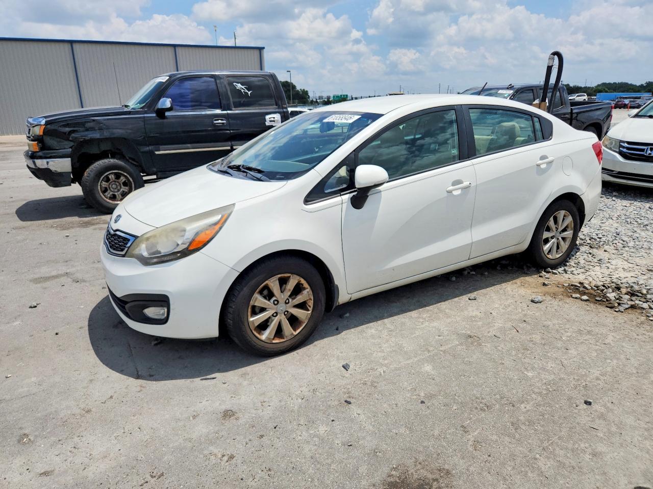 2013 Kia Rio EX, VIN KNADN4A3XD6131004 — Water / flood