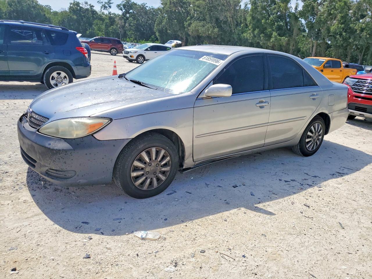 2002 Toyota Camry XLE, VIN 4T1BE32K22U099146 — Side