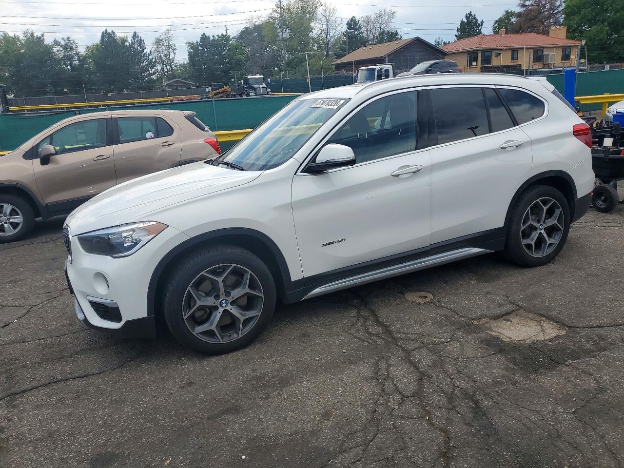 2018 BMW X1 xDrive28i, VIN WBXHT3C36J5K25323 — Rear end