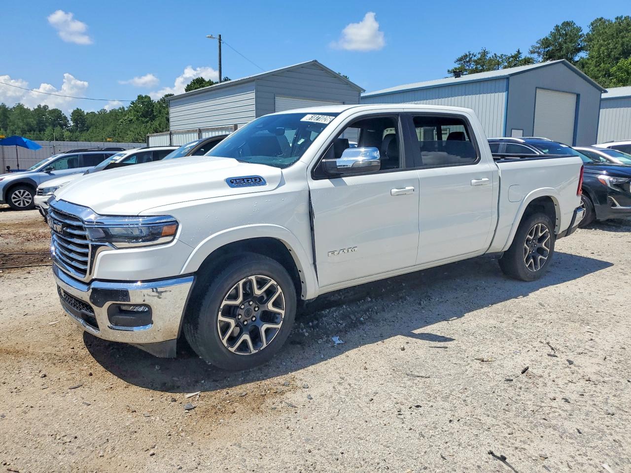 2026 Ram 1500 Laramie, VIN 3C6SRFJP7T4177182 — Minor dents and scratches