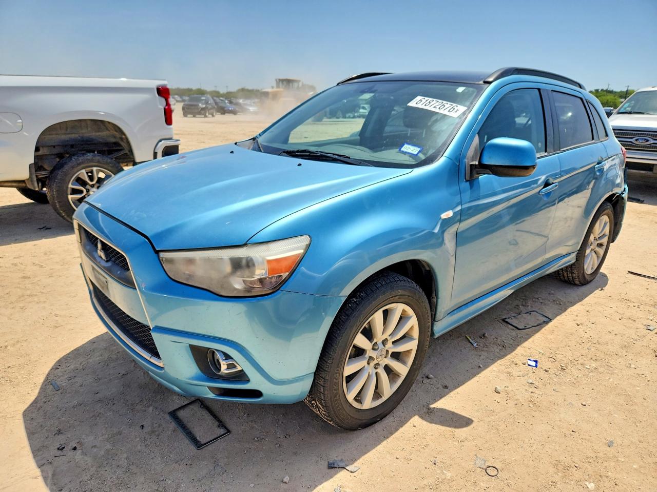 2011 Mitsubishi Outlander SE, VIN JA4AR4AU3BZ003714 — Rear end