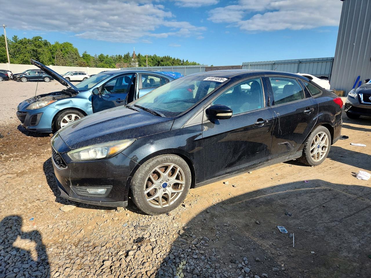 2015 Ford Focus SE, VIN 1FADP3F25FL340166 — Rear end