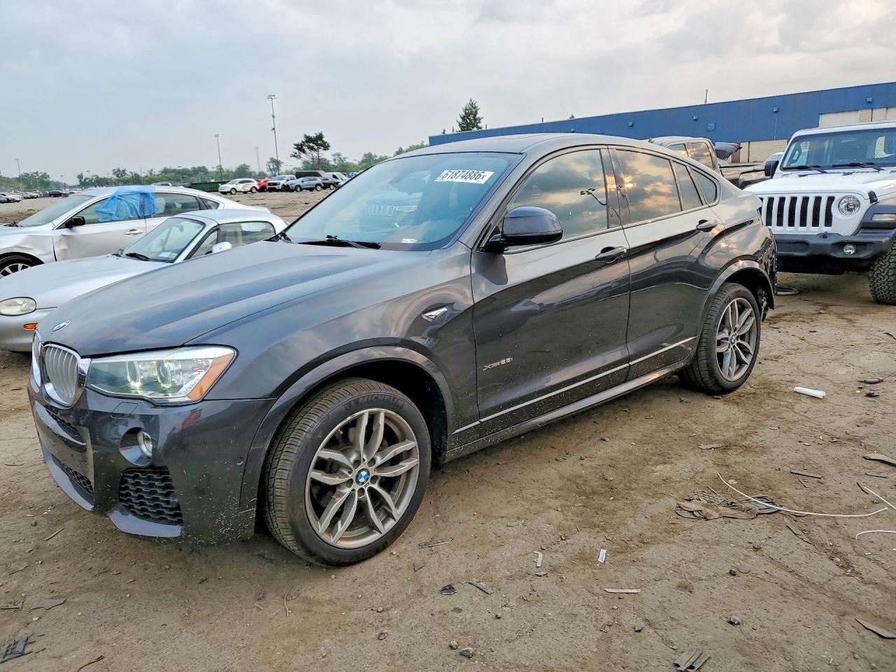 2016 BMW X4 xDrive28i, VIN 5UXXW3C51G0R20847 — Rear end