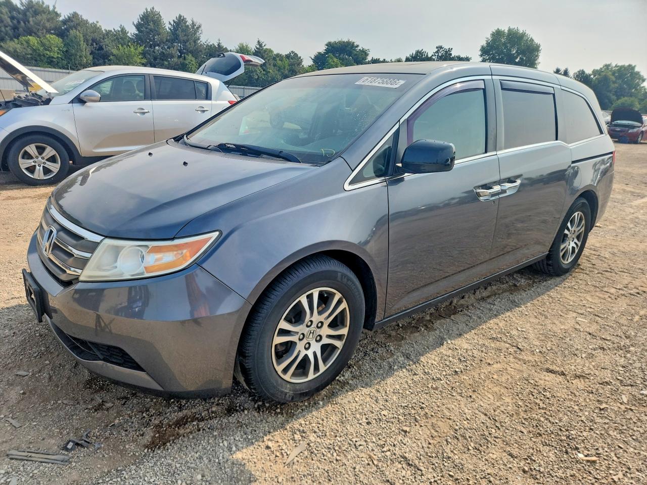 2012 Honda Odyssey EX-L, VIN 5FNRL5H60CB101534 — Hail
