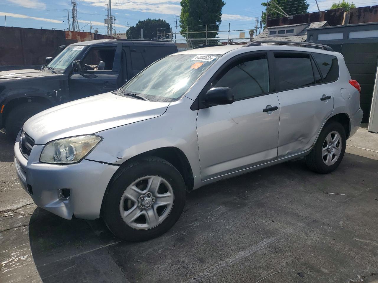 2011 Toyota RAV4, VIN JTMZF4DV0BD031506 — Side