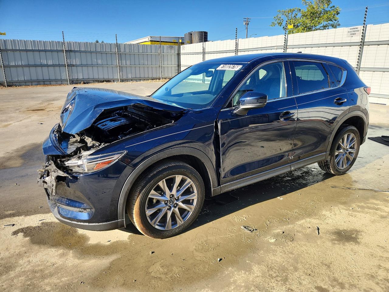 2019 Mazda CX-5 Grand Touring, VIN JM3KFADM5K1538854 — Перед