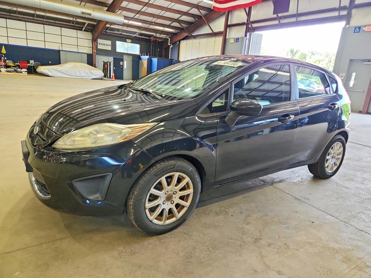 2011 Ford Fiesta SE, VIN 3FADP4EJXBM113000 — Minor dents and scratches