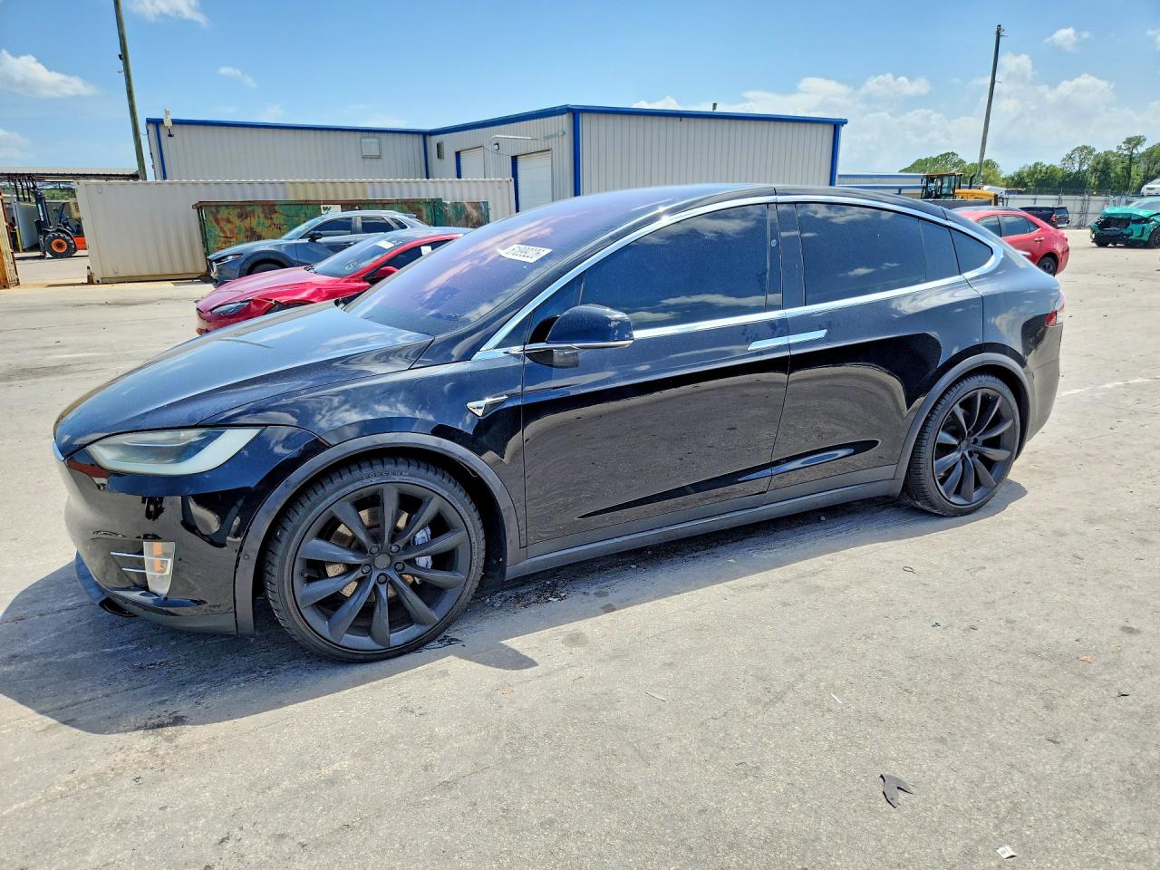 2018 Tesla Model X 75D, VIN 5YJXCBE23JF120499 — Rear end
