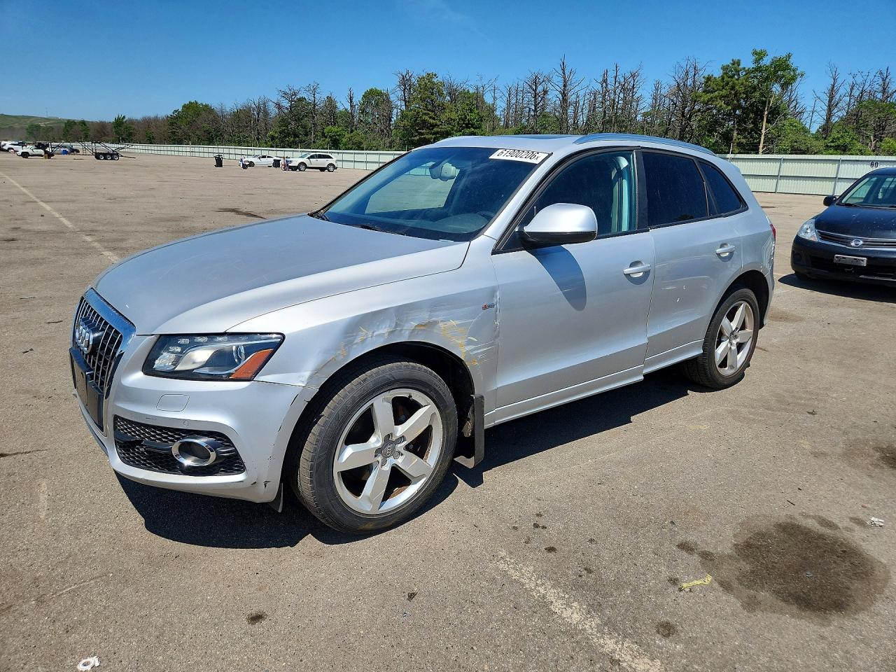 2012 Audi Q5 Premium Plus, VIN WA1DKAFP9CA114934 — Side