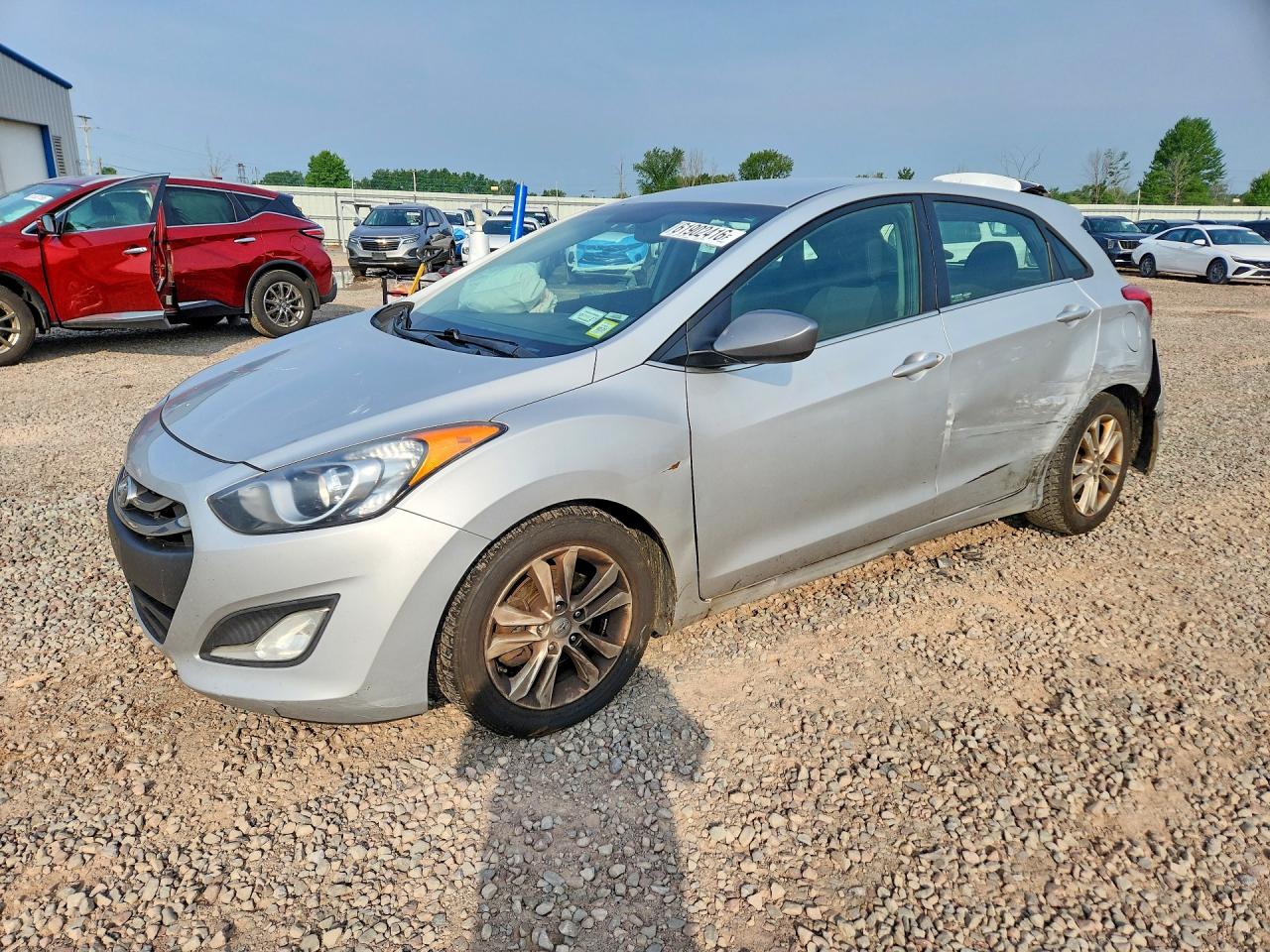 2013 Hyundai Elantra, VIN KMHD35LEXDU061377 — Side