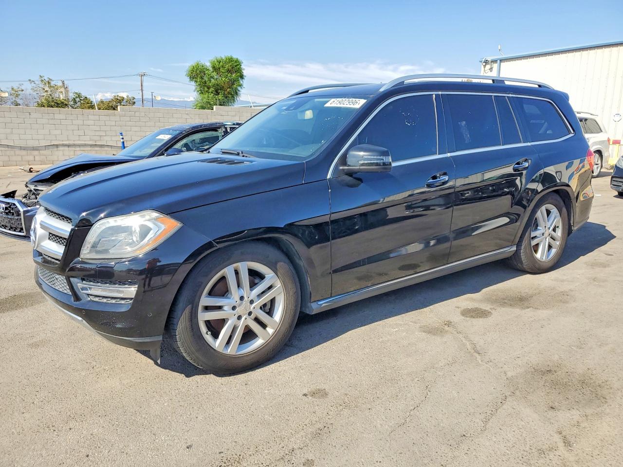 2015 Mercedes-Benz GL 450, VIN 4JGDF6EE0FA459485 — Minor dents and scratches