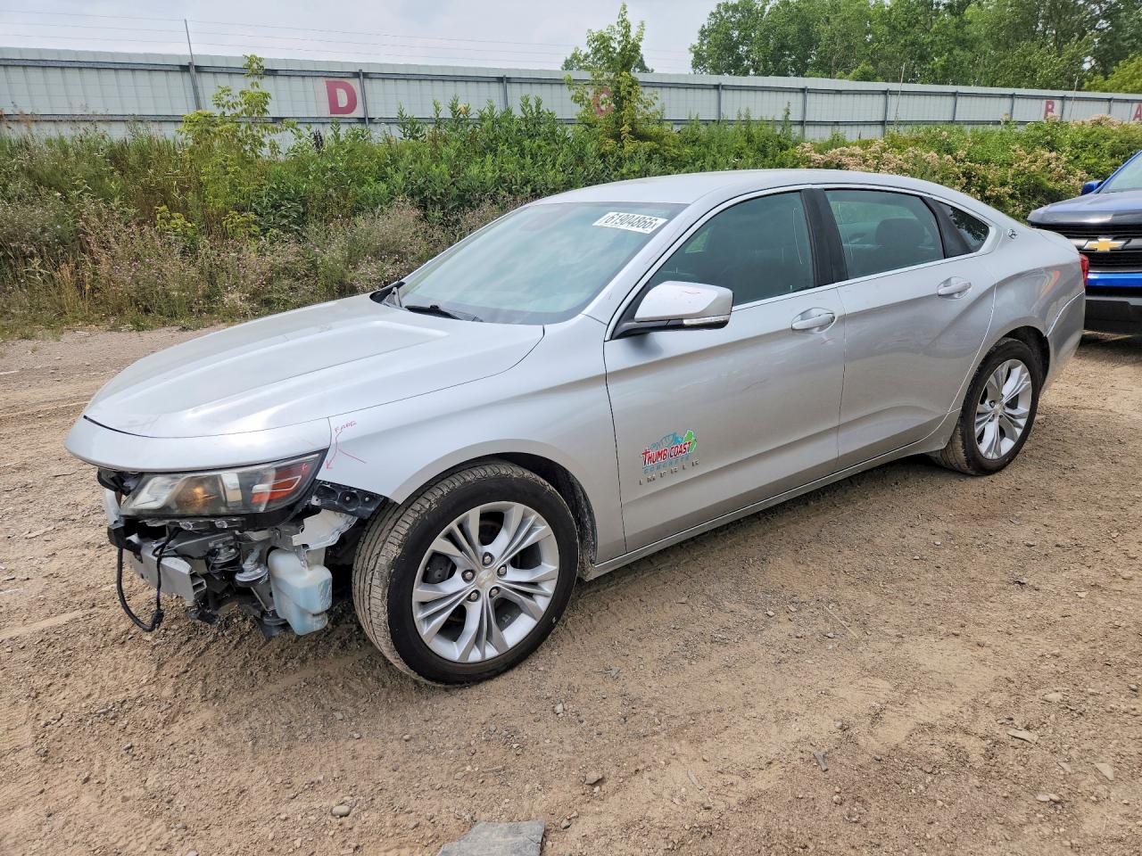 2014 Chevrolet Impala LT, VIN 2G1115SL1E9252996 — Side