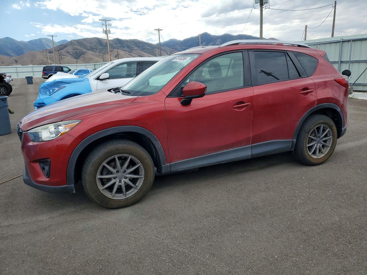 2013 Mazda CX-5 Touring, VIN JM3KE4CE5D0121600 — Side