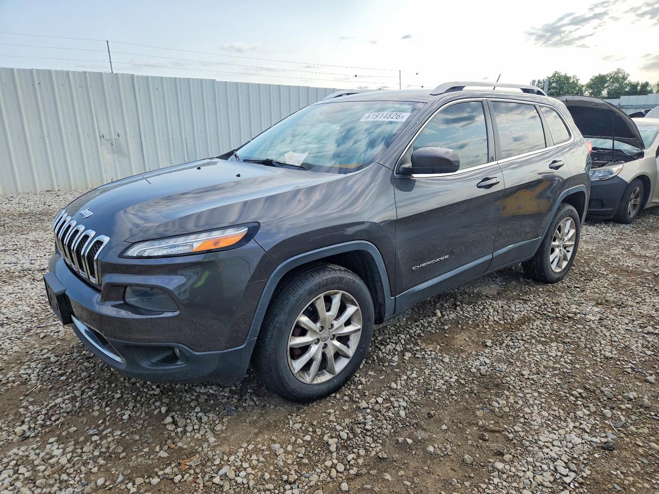 2014 Jeep Cherokee Limited, VIN 1C4PJMDS5EW218843 — Side