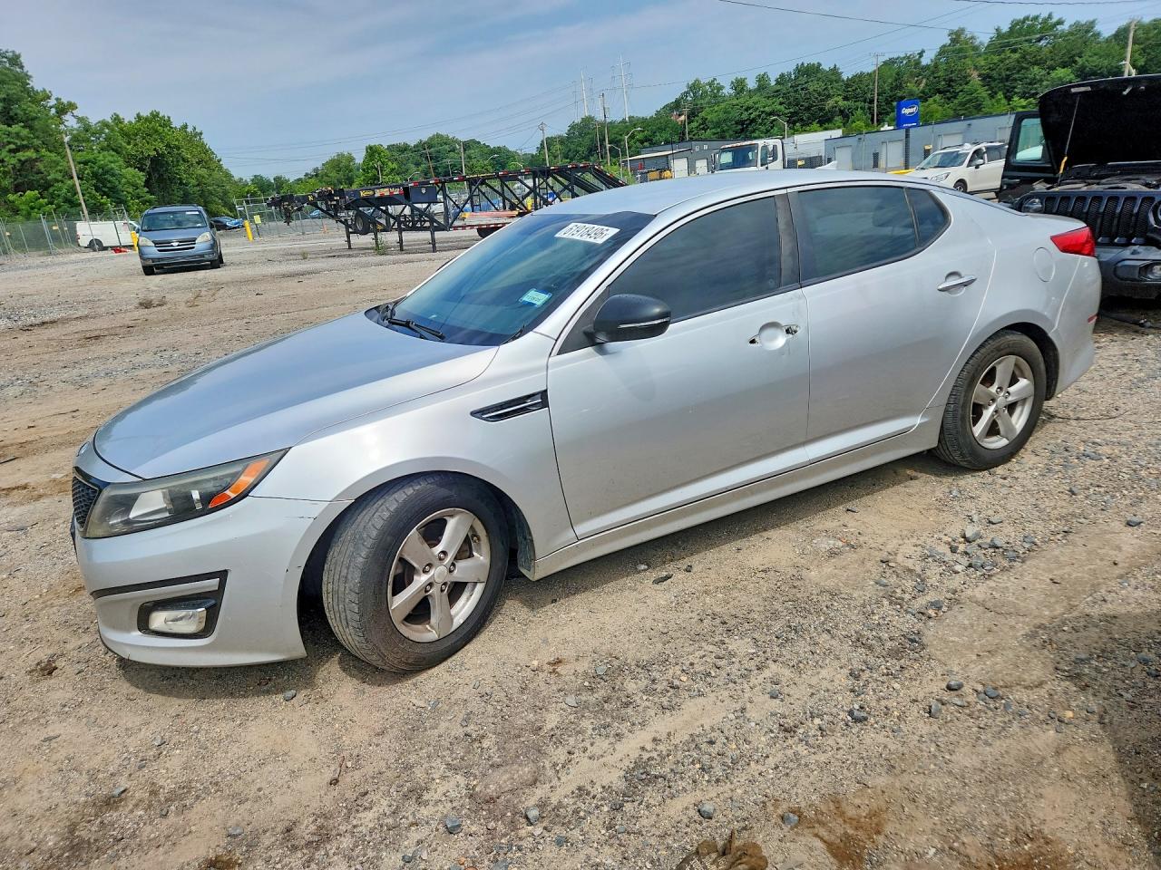 2014 Kia Optima LX, VIN 5XXGM4A77EG262383 — Vandalism
