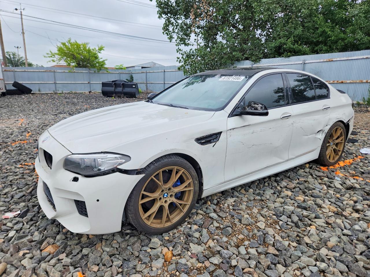 2014 BMW 5 Series 550i xDrive, VIN WBAKP9C59ED693292 — Side
