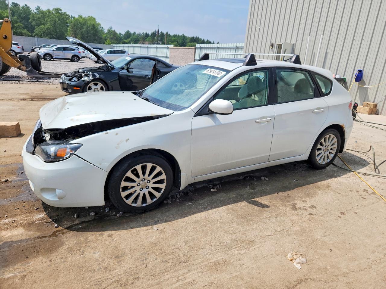 2011 Subaru Impreza Premium, VIN JF1GH6B68BH810157 — Перед