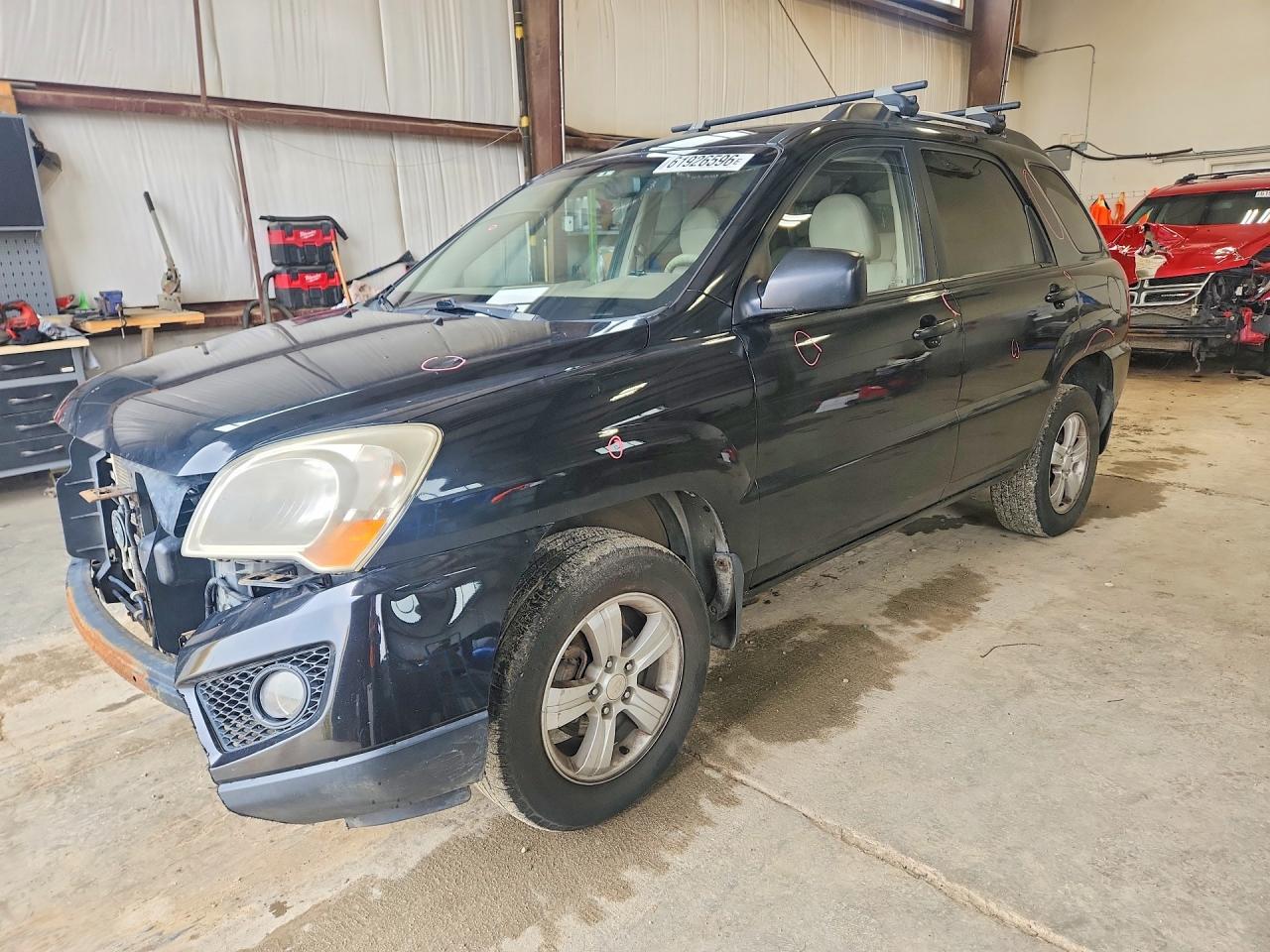 2009 Kia Sportage, VIN KNDJF722997597275 — Front end