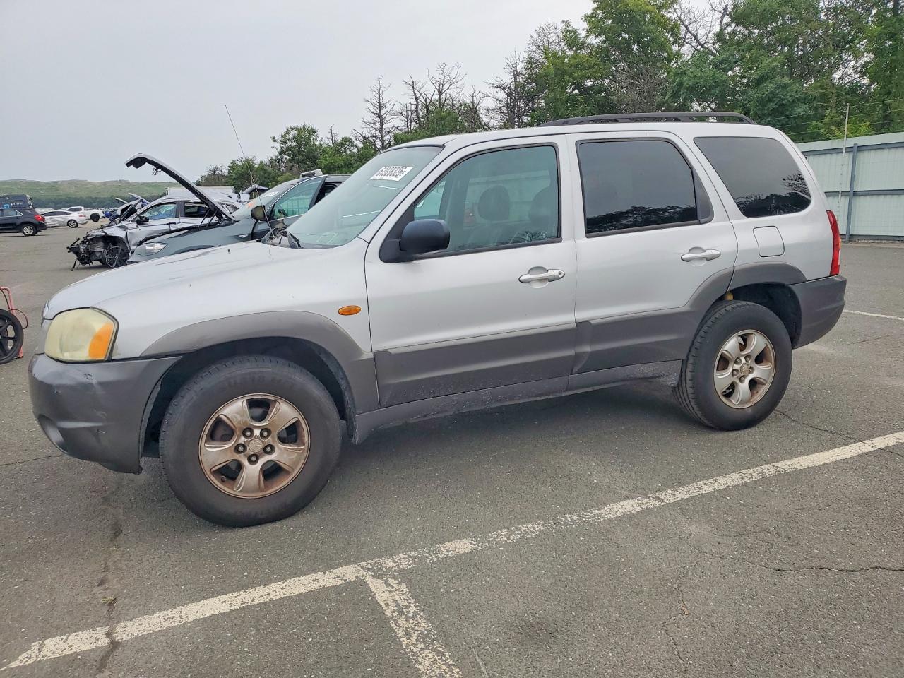 2004 Mazda Tribute ES, VIN 4F2CZ96194KM12807 — Side
