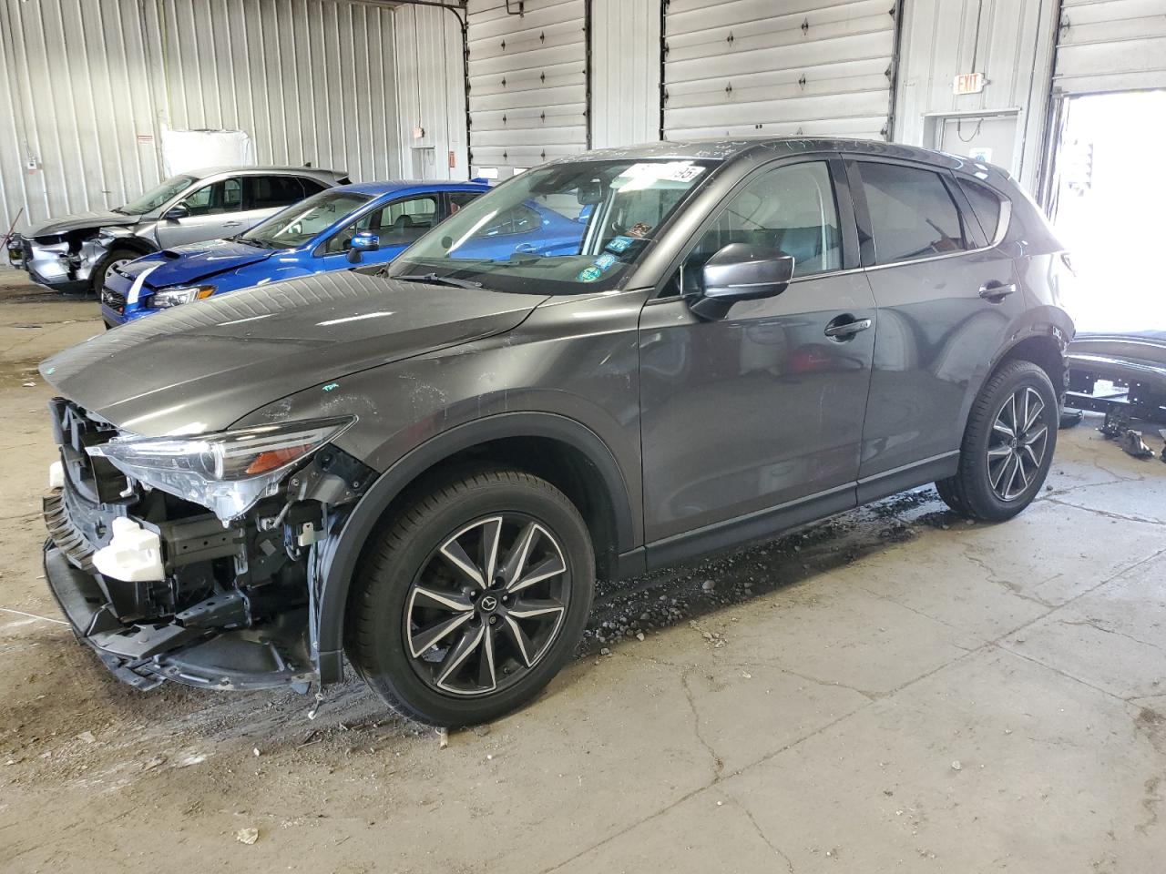 2017 Mazda CX-5 Grand Touring, VIN JM3KFBDL8H0163036 — Rejected repair