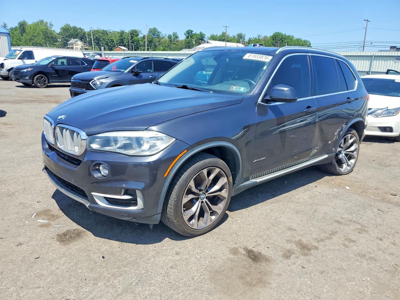 2015 BMW X5 xDrive35i, VIN 5UXKR0C58F0P14486 — Side