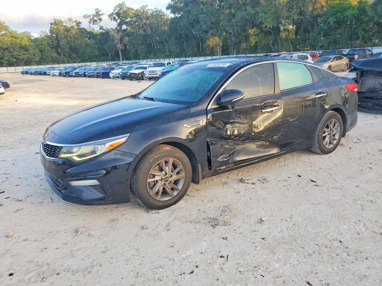 2019 Kia Optima LX, VIN 5XXGT4L34KG346783 — Side