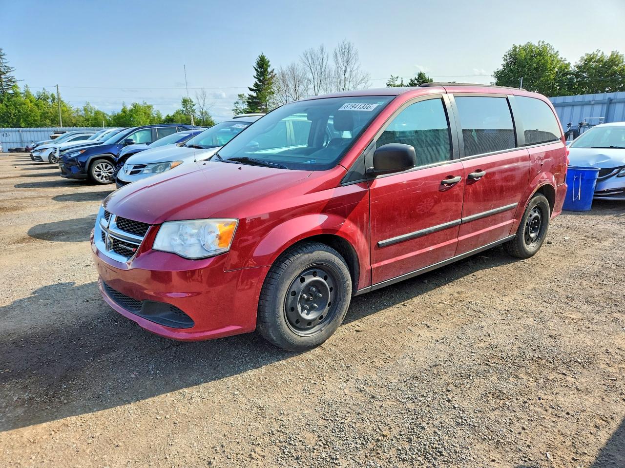 2014 Dodge Grand Caravan SE, VIN 2C4RDGBG6ER174182 — Бок